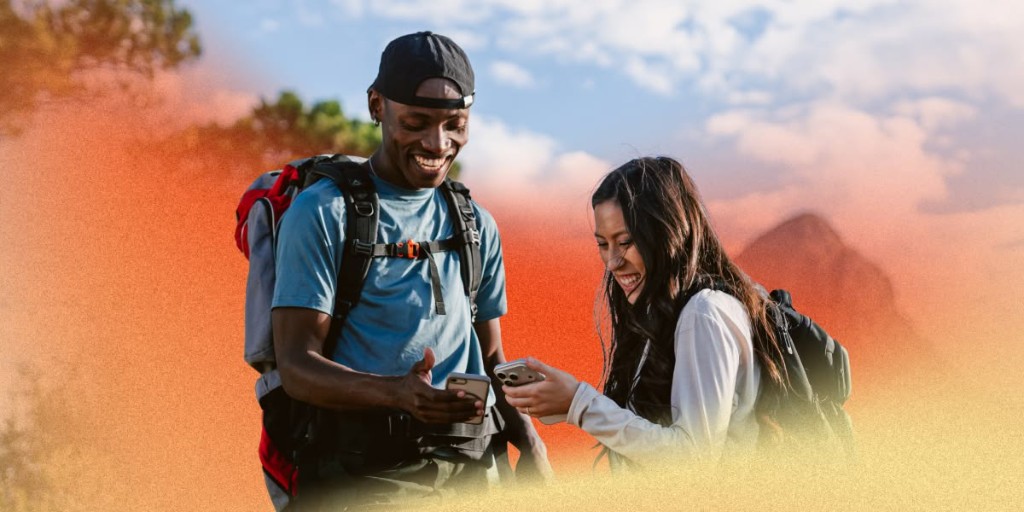 Two people looking at their phones